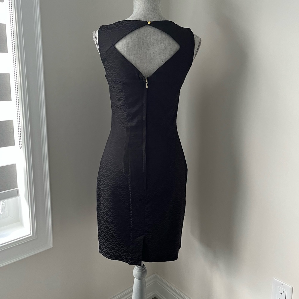 H&M LBD! Back cutout is sexy yet classy. zip back. SIZE 6